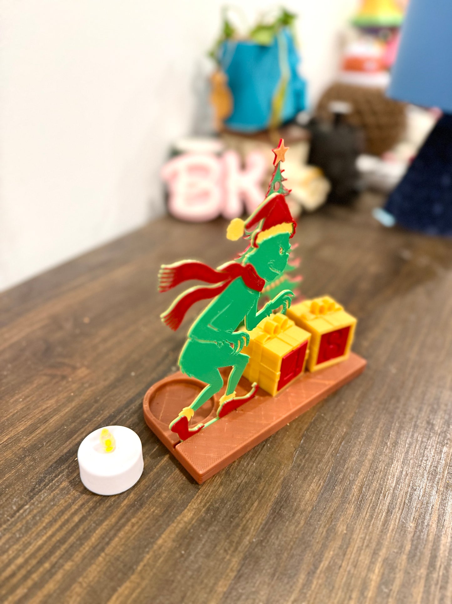 3D Printed Grinch-Inspired Christmas Countdown Tea Light Decor