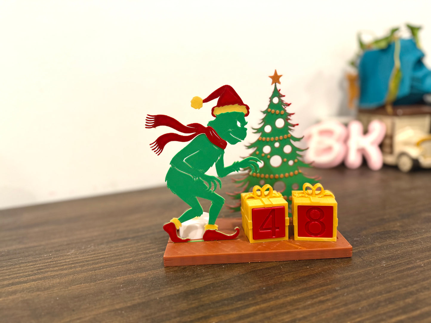 3D Printed Grinch-Inspired Christmas Countdown Tea Light Decor